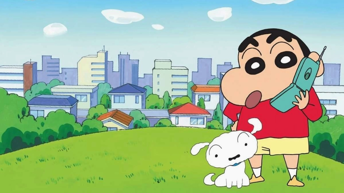Hình nền Shin cậu bé bút chì cute đáng yêu trong bộ đồ ngủ màu vàng quen thuộc.